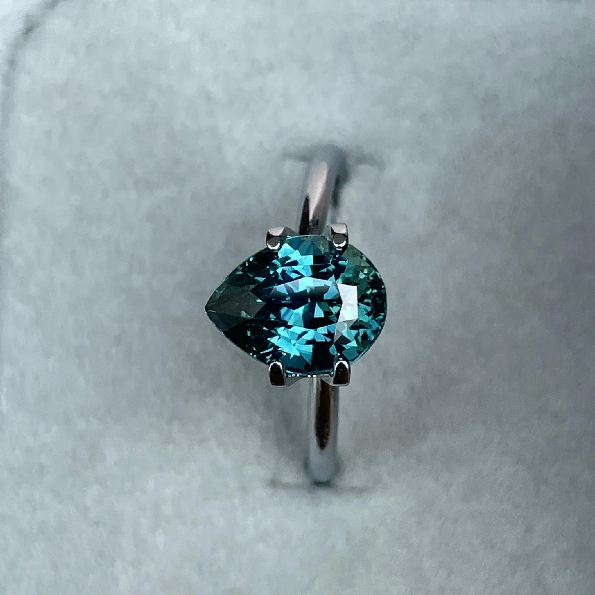 3.18 Carat Teal Sapphire Pear shape. Clean stone.
