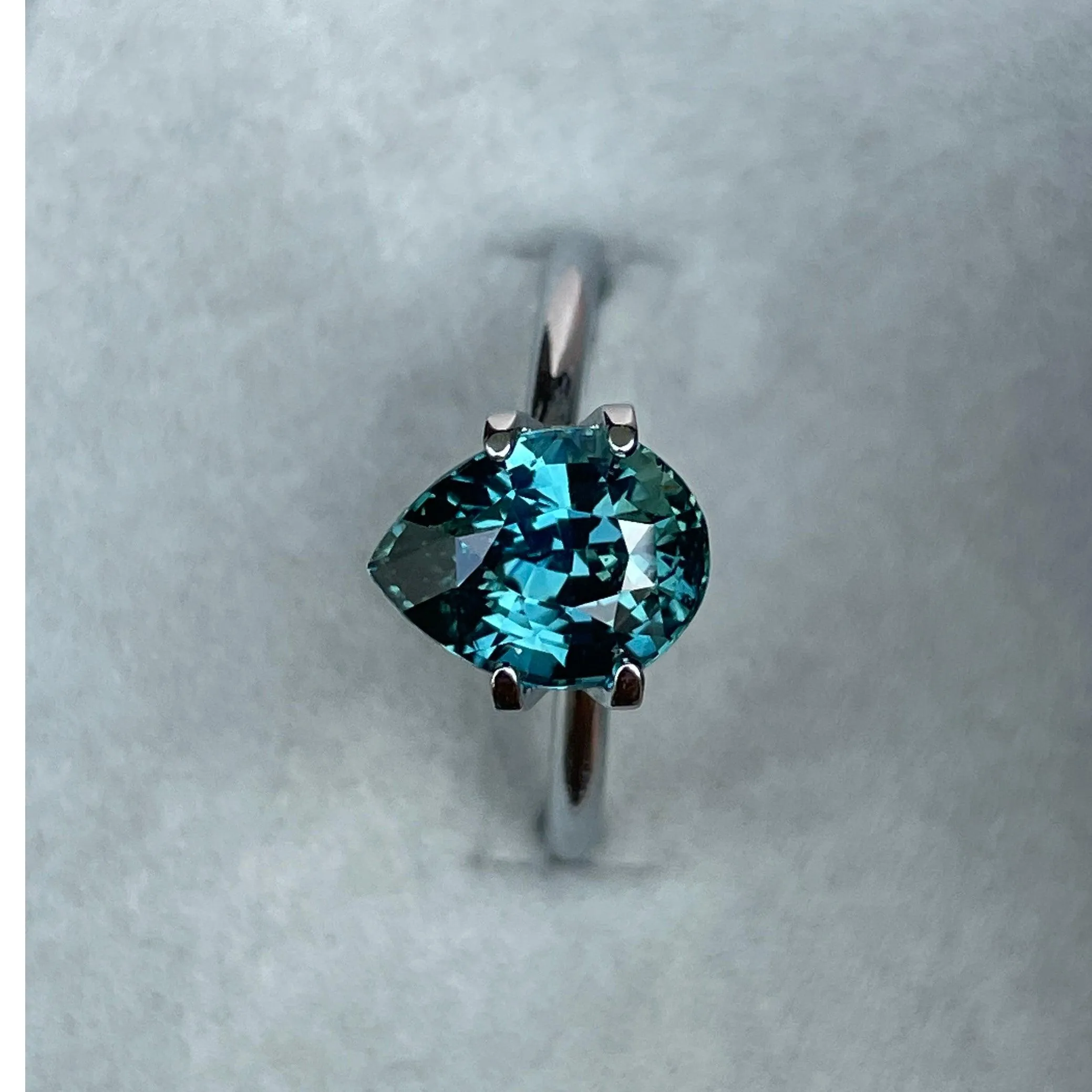 3.18 Carat Teal Sapphire Pear shape. Clean stone.