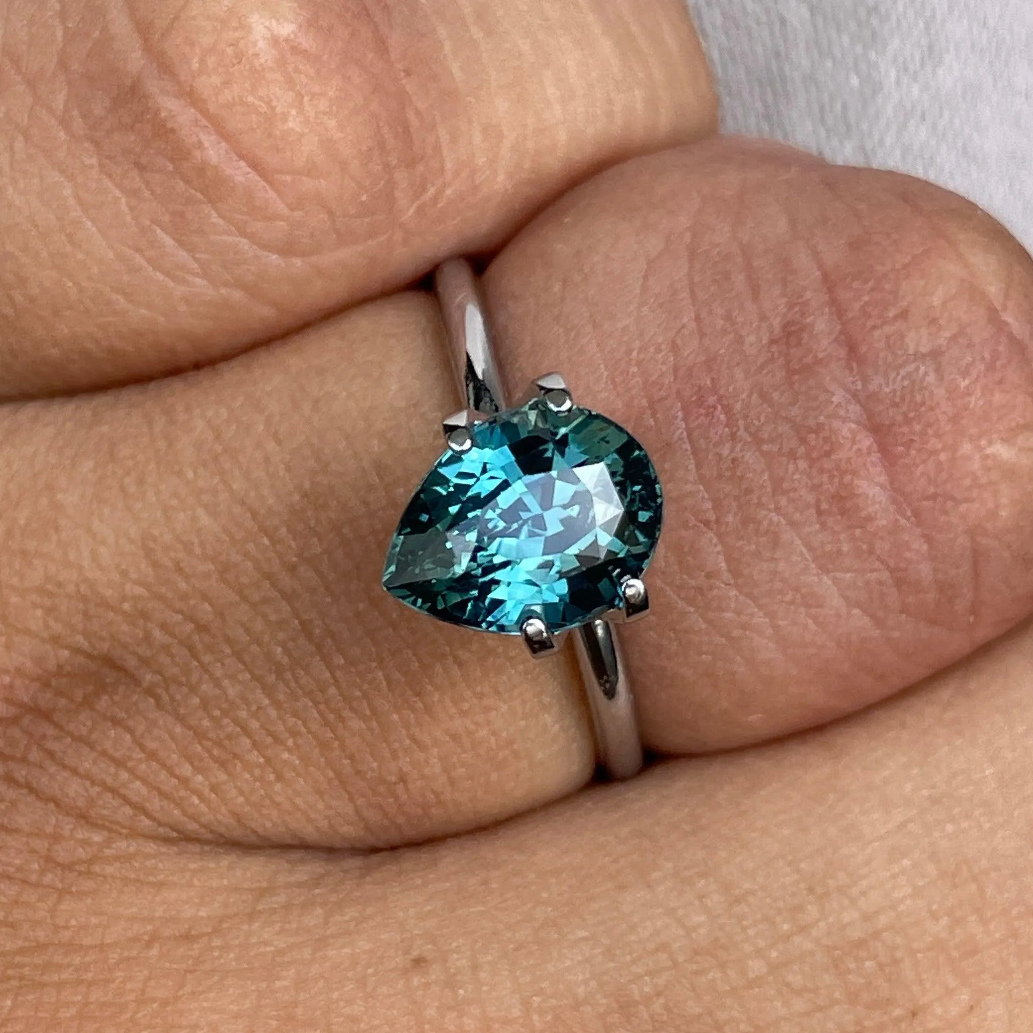 3.18 Carat Teal Sapphire Pear shape. Clean stone.