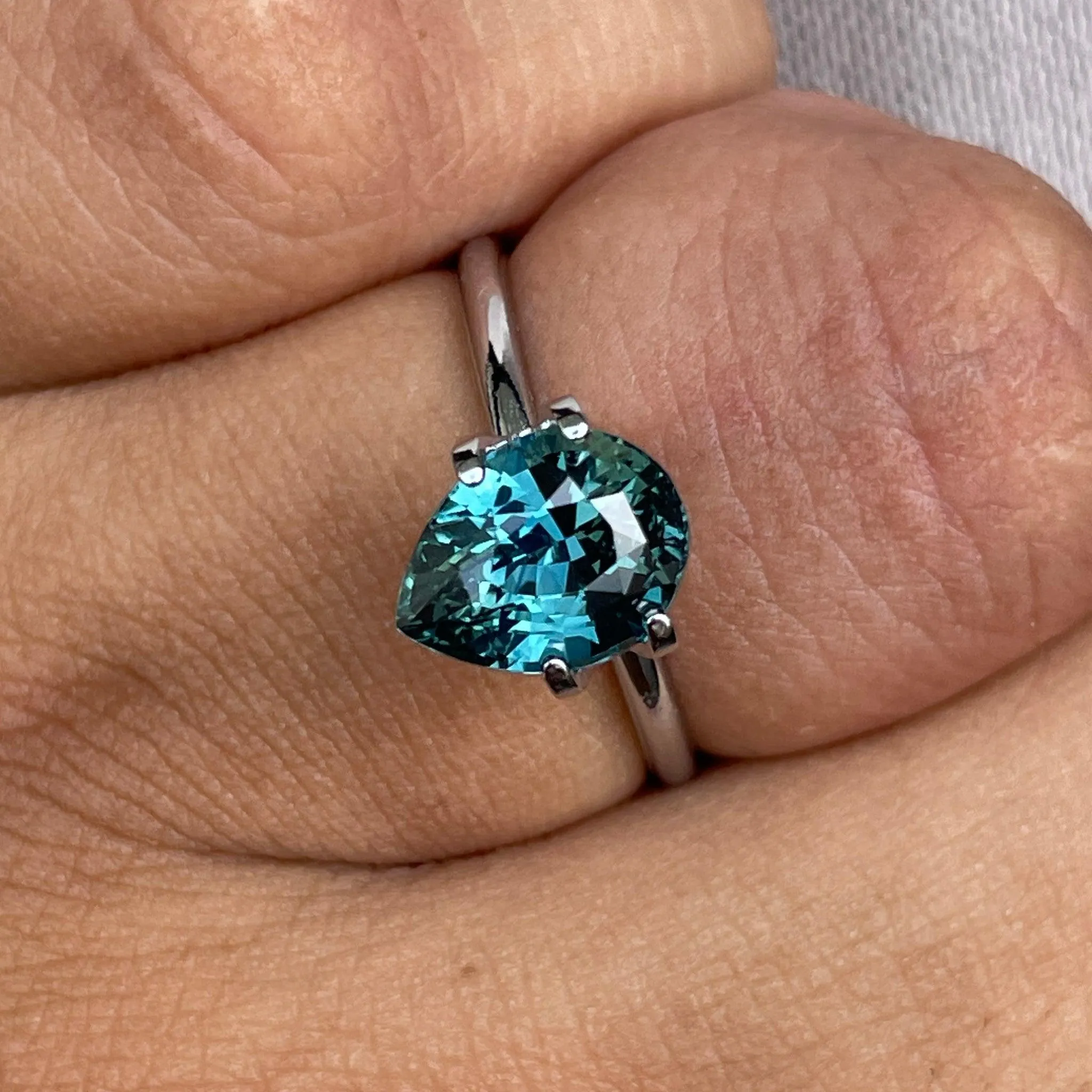 3.18 Carat Teal Sapphire Pear shape. Clean stone.
