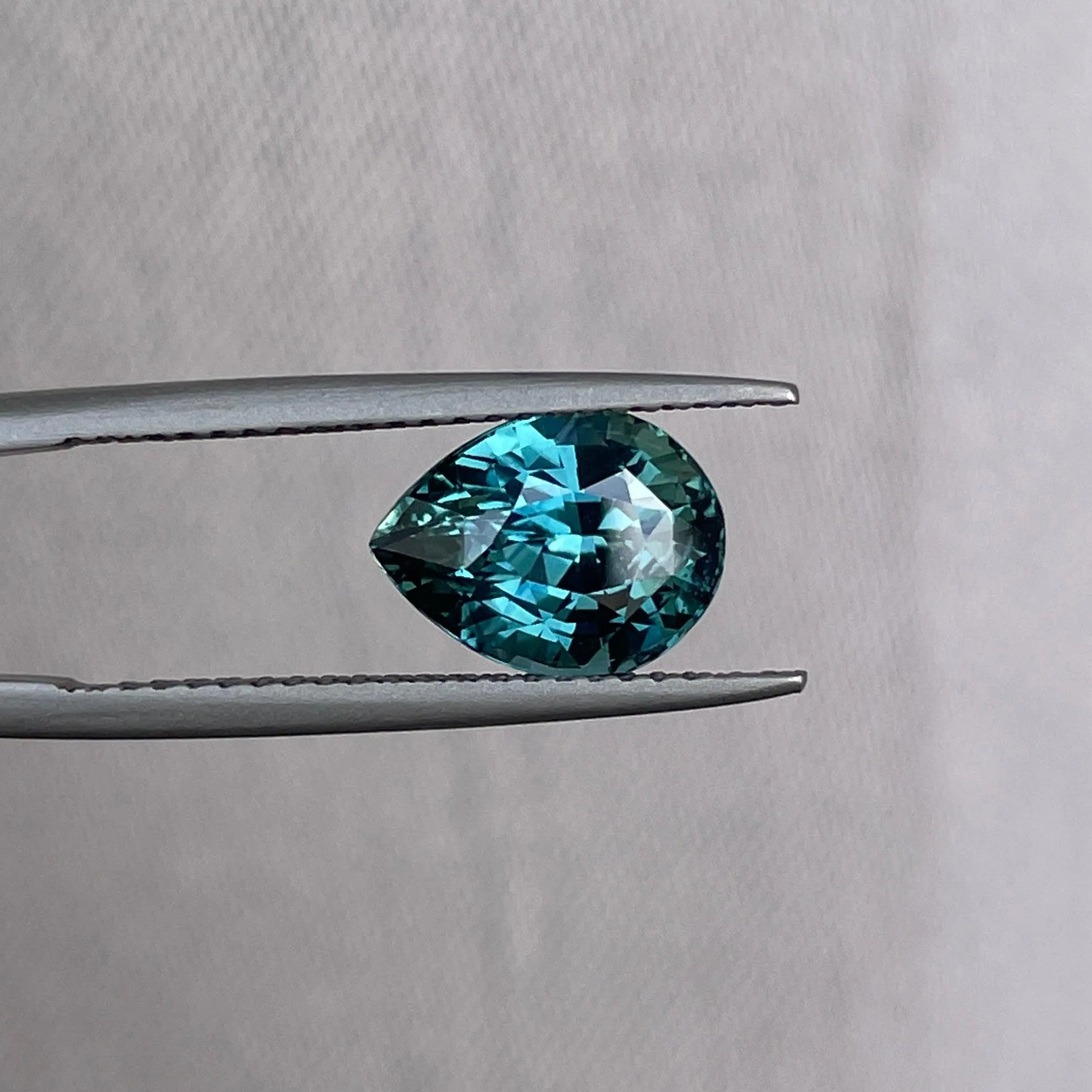 3.18 Carat Teal Sapphire Pear shape. Clean stone.