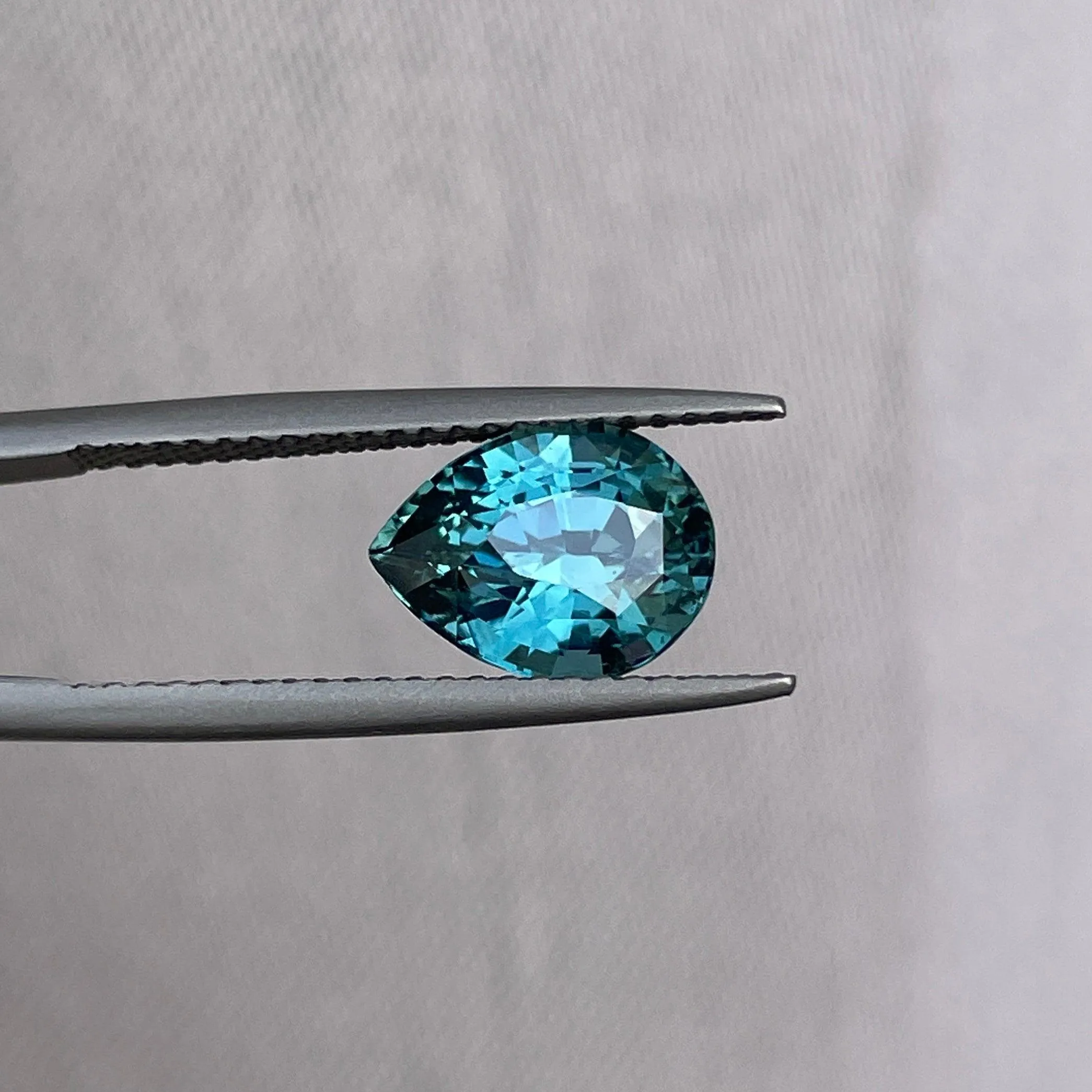 3.18 Carat Teal Sapphire Pear shape. Clean stone.
