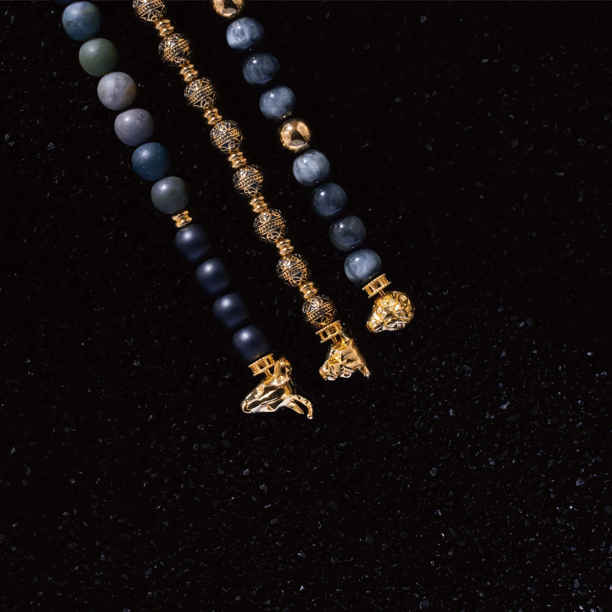 Gold Deer, obsidian, garnet bracelet with gold connector