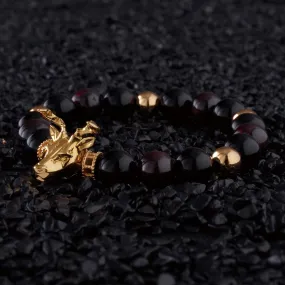 Gold Deer, obsidian, garnet bracelet with gold connector