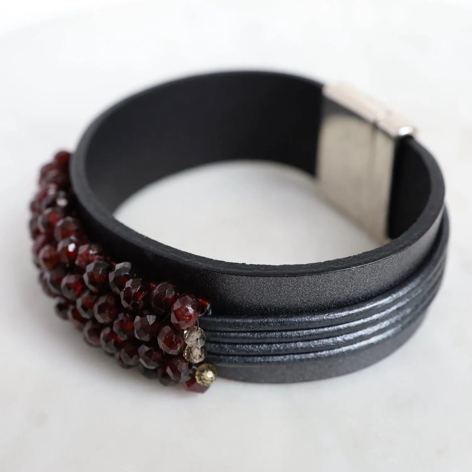 Hand Stitched Faceted Garnet with Spinel Trim on Multi Graphite Leather Bracelet