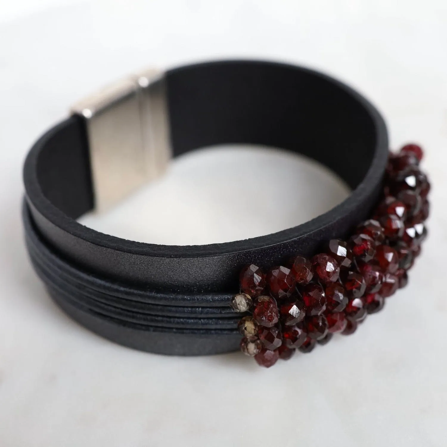 Hand Stitched Faceted Garnet with Spinel Trim on Multi Graphite Leather Bracelet