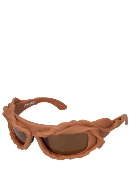 Ottolinger   3D twisted frame sunglasses 