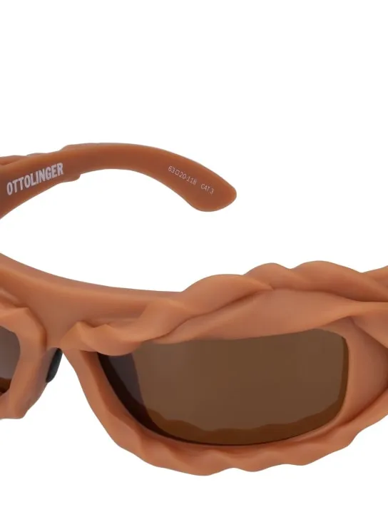 Ottolinger   3D twisted frame sunglasses 