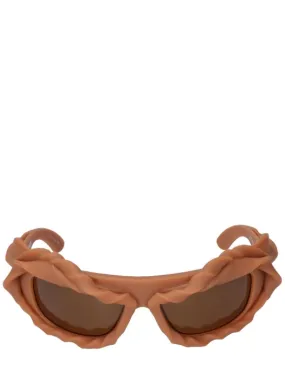 Ottolinger   3D twisted frame sunglasses 