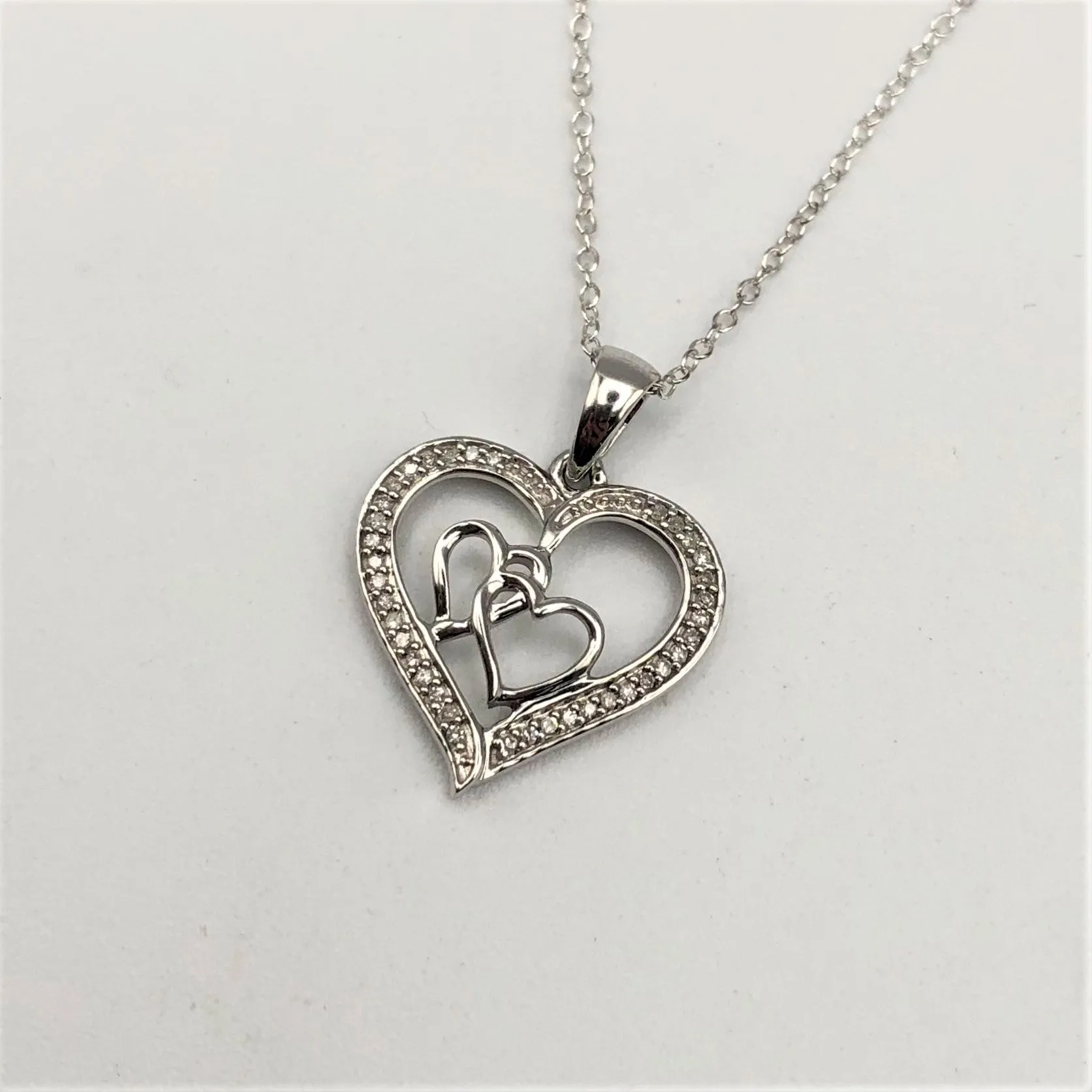 Sterling Silver 1/8 Carat TW Diamond Heart Pendant Necklace