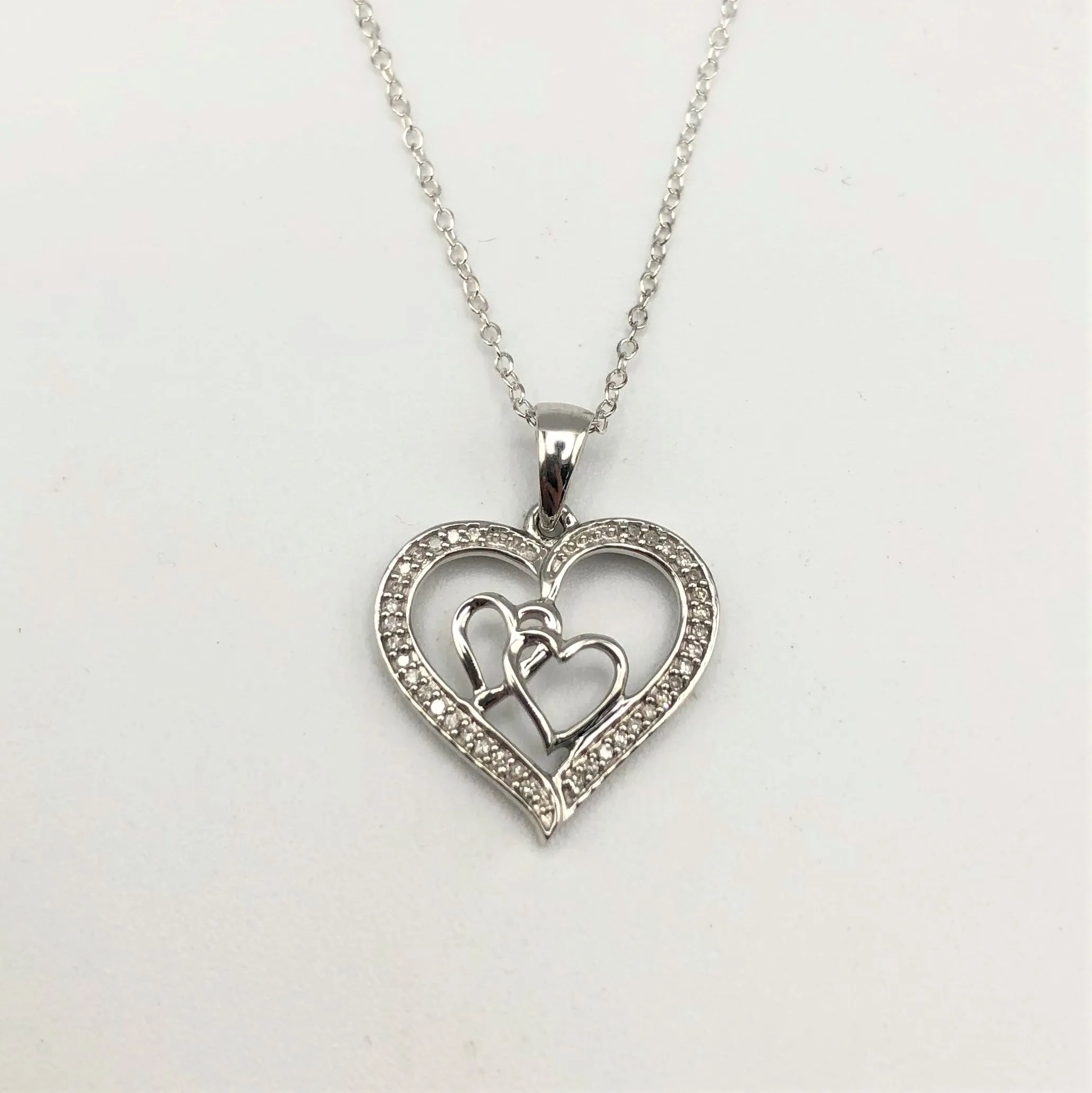 Sterling Silver 1/8 Carat TW Diamond Heart Pendant Necklace