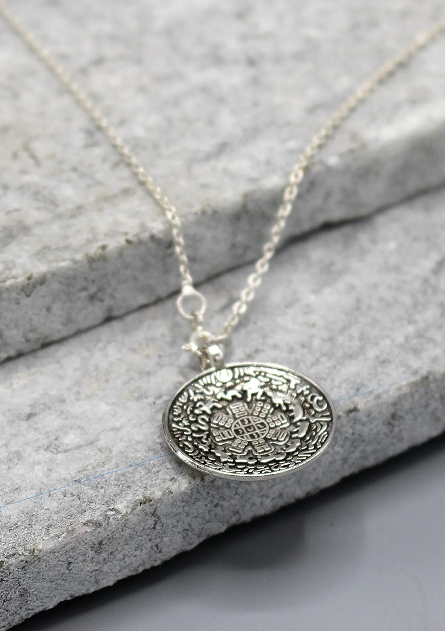 Tibetan Mandala and Om Carving Pendant