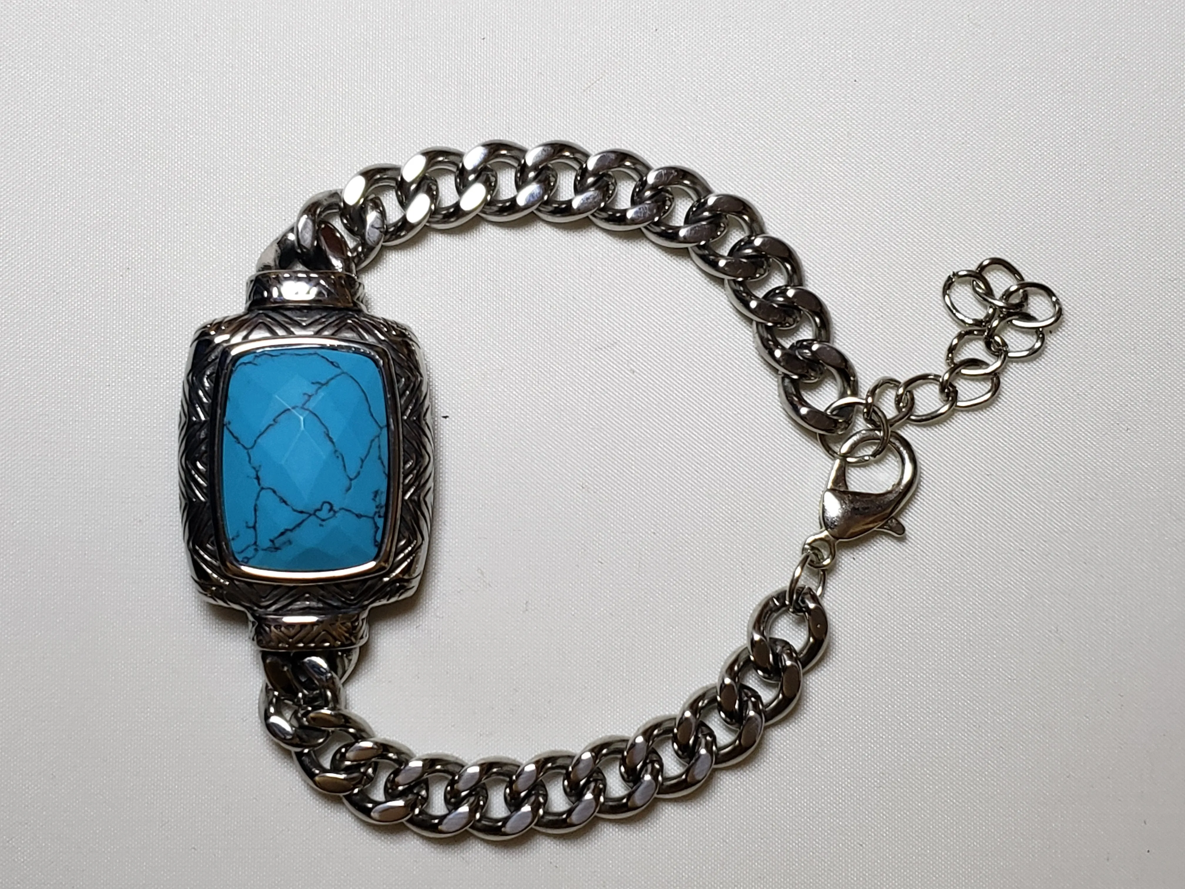 Turquoise Dyed Howlite (20 ctw) in Hand Faceted Black Oxidized Stainless Steel Bracelet, with 316 Chain and Lobster Claw Clasp. Adjustable 8.5"-9.5"